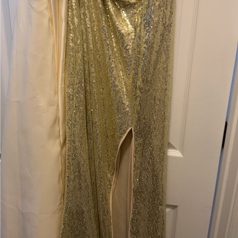 Elegant gold gown with cream skirt